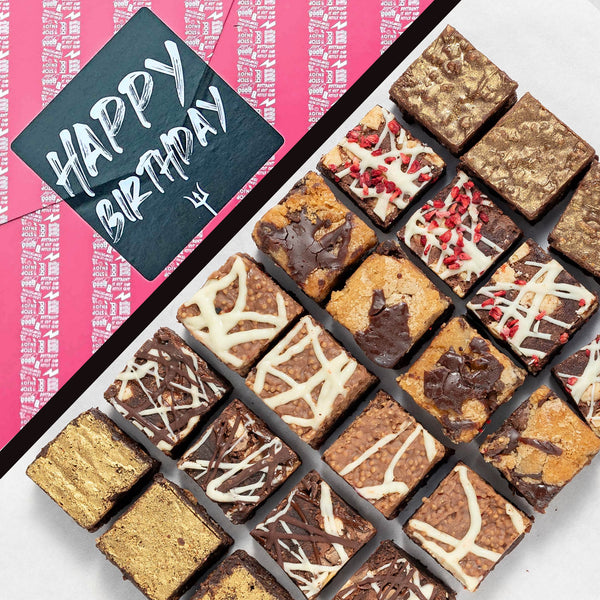 A grid of decorated brownie bites on a neutral background with a Happy Birthday graphic in the corner