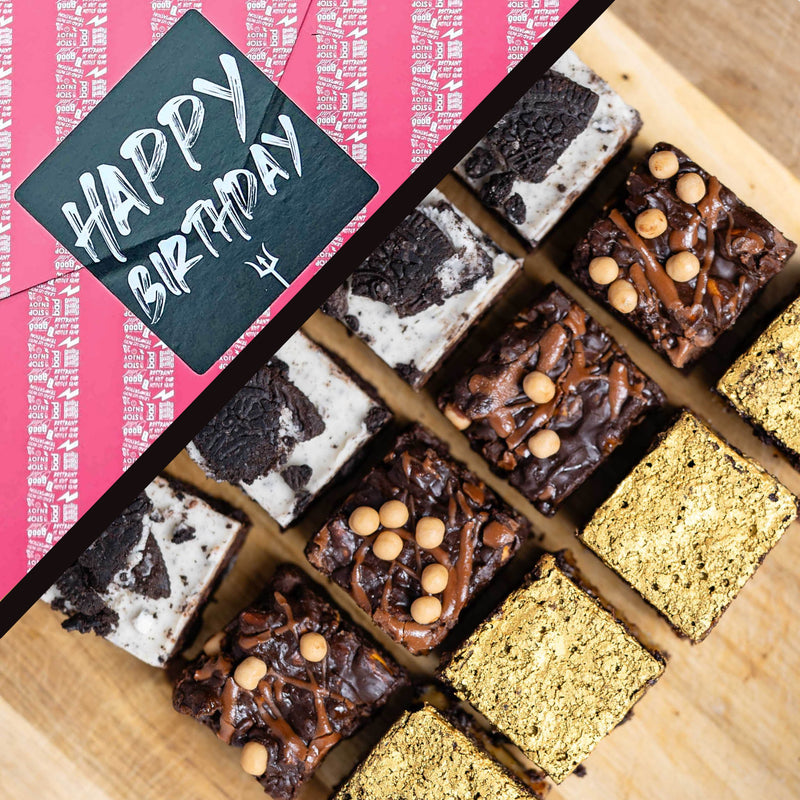 A styled flat-lay of assorted chocolate brownies arranged on a wooden board, with a pink gift wrap reading “HAPPY BIRTHDAY