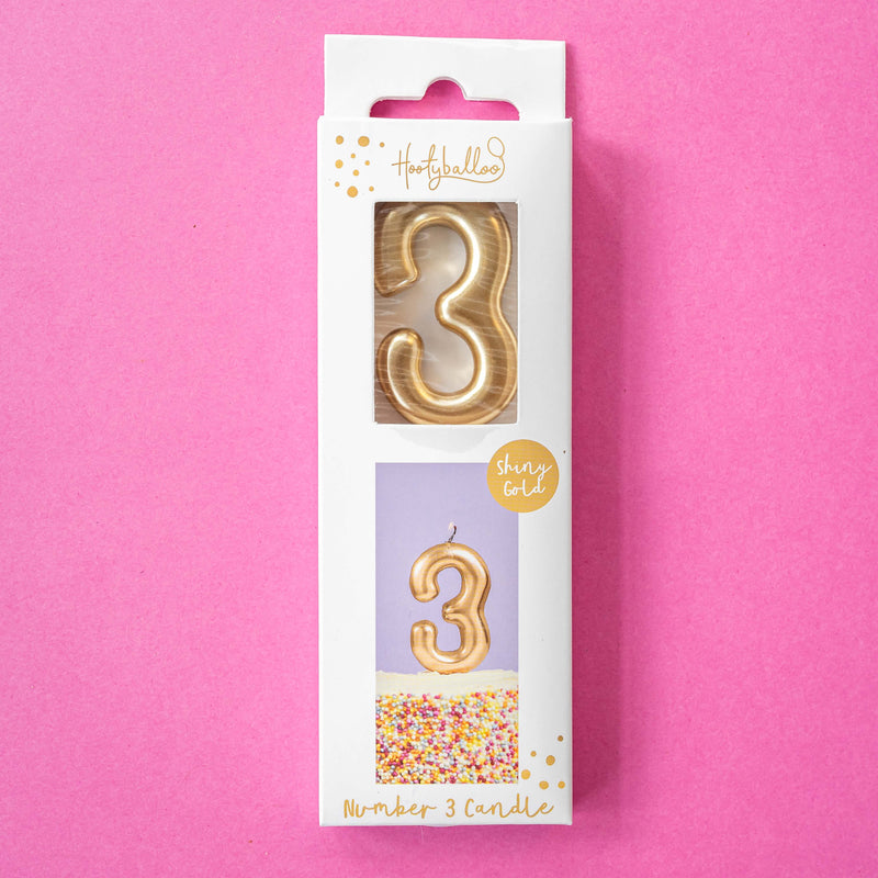 Gold metallic number candles