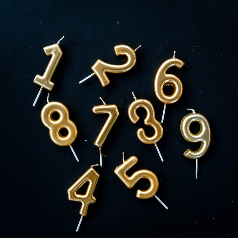 Gold metallic number candles