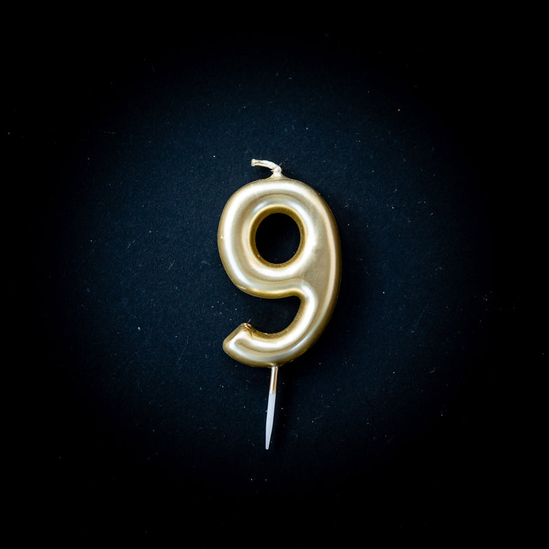 Gold metallic number candles