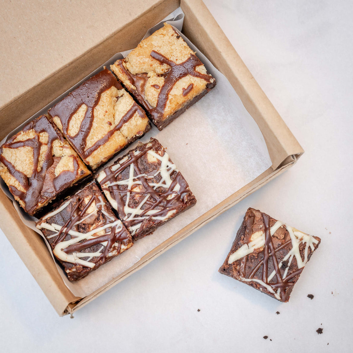 postal chocolate brownie box on a pale background