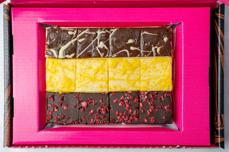 Assorted chocolate brownie flavours with marshmallow  in a pink box