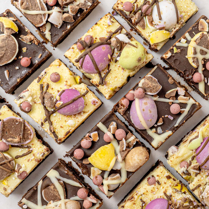 mini egg chocolate brownies on pale background