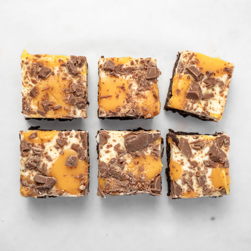 6 pieces of white chocolate and passionfruit chocolate brownies